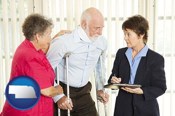 injured person consulting with a personal injury attorney - with Nebraska icon
