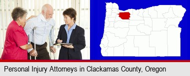 injured person consulting with a personal injury attorney; Clackamas County highlighted in red on a map