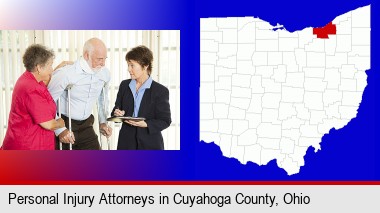 injured person consulting with a personal injury attorney; Cuyahoga County highlighted in red on a map