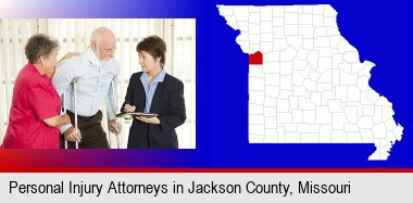 injured person consulting with a personal injury attorney; Jackson County highlighted in red on a map