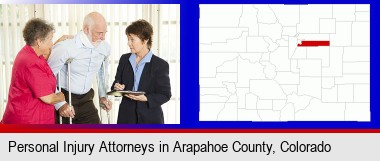 injured person consulting with a personal injury attorney; Arapahoe County highlighted in red on a map