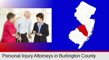 injured person consulting with a personal injury attorney; Burlington County highlighted in red on a map