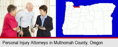 injured person consulting with a personal injury attorney; Multnomah County highlighted in red on a map
