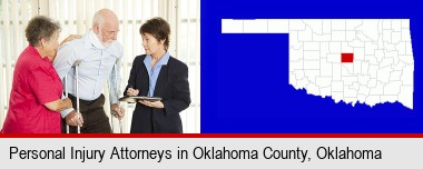 injured person consulting with a personal injury attorney; Oklahoma County highlighted in red on a map