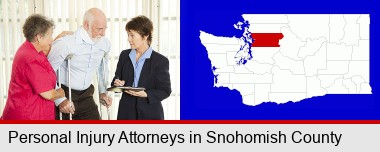 injured person consulting with a personal injury attorney; Snohomish County highlighted in red on a map